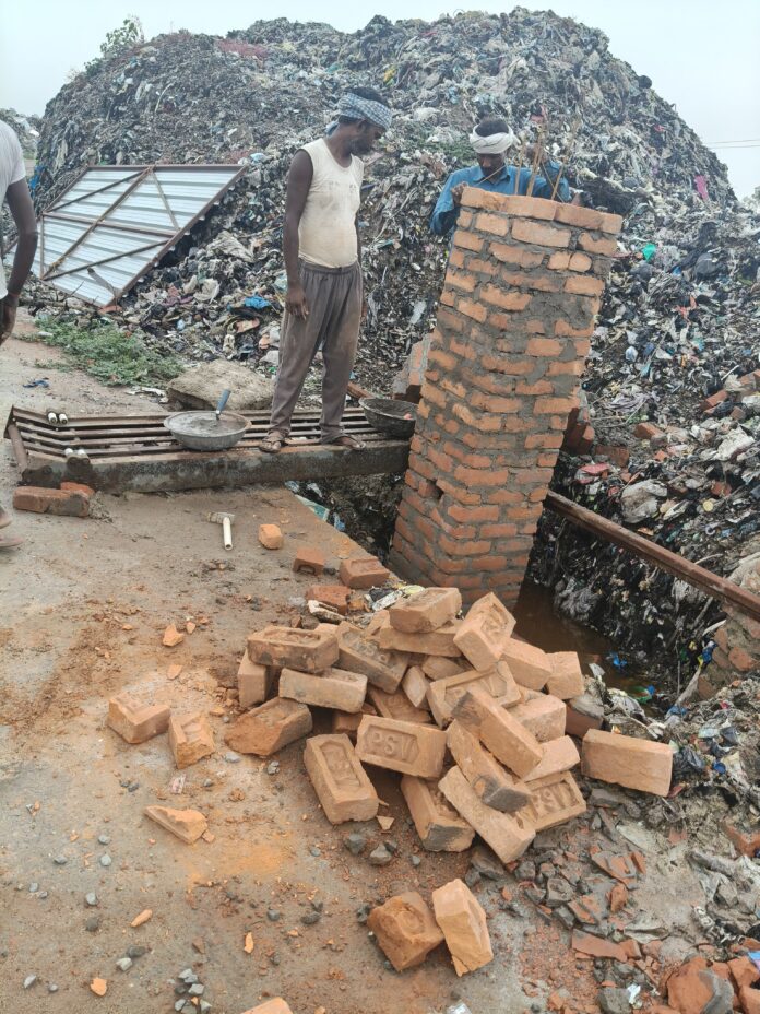 Questions have been raised about the quality of the gate construction at the Bangaon Kachana dumping ground; villagers have expressed displeasure over the use of yellow bricks.